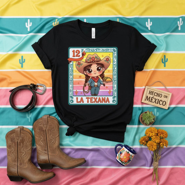 LA TEXANA Lotería Card 12 Unisex T-Shirt - Cute Cartoon Cowgirl Graphic Tee with Sombrero, Lasso, and Taco - Mexican Bingo Style Southwest Western Theme Shirt