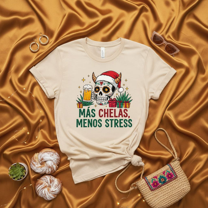 Más Chelas, Menos Stress T-Shirt, Christmas Sugar Skull with Santa Hat Drinking Beer Tee, Day of the Dead Holiday Party Top, Funny Unisex Gift Shirt, Mexican Beer Quote Apparel