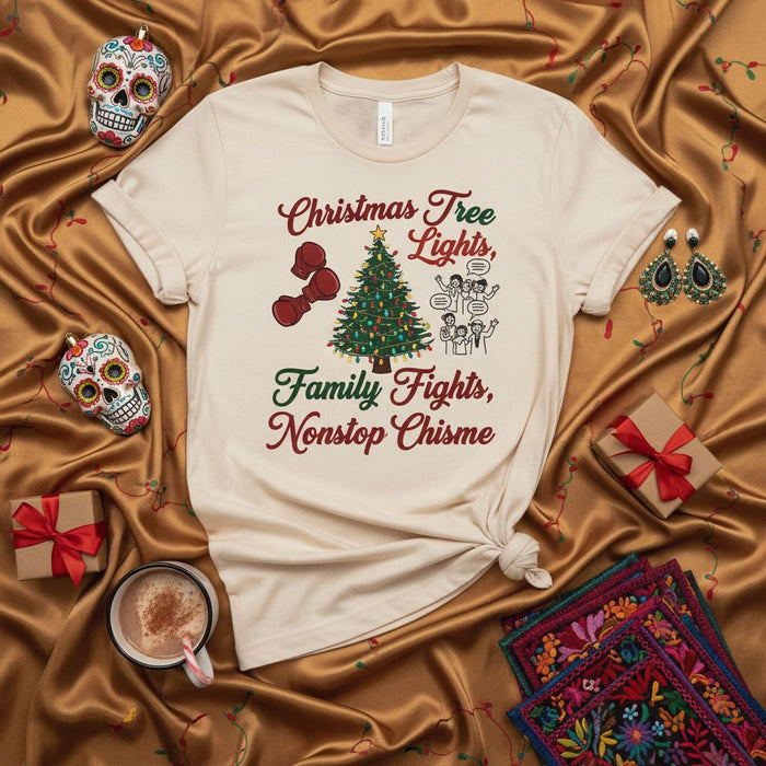 Christmas Tree Lights Family Fights Nonstop Chisme T-Shirt, Funny Holiday Shirt with Boxing Gloves, Xmas Party Gift, Latino Family Christmas Shirt, Beige Unisex Tee, Spanglish Saying, Navidad Humor.