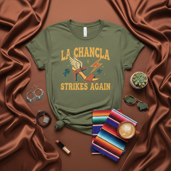 La Chancla Strikes Again T-Shirt | Funny Latina Mom Gift | Mexican Culture Humor Tee | Nostalgic Latinx Spanglish Graphic Shirt | Olly Green Unisex Apparel