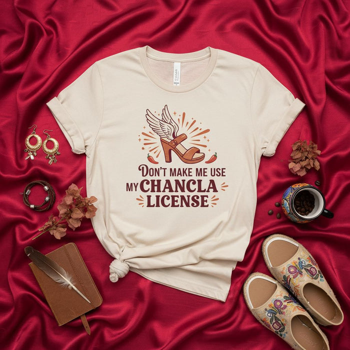 Don't Make Me Use My Chancla License T-Shirt - Funny Latino Mom Gift, La Chancla Weapon, Hispanic Culture Tee, Mama Shoe with Wings Graphic, Unisex Softstyle Shirt