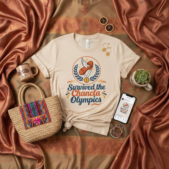 Survived the Chancla Olympics T-Shirt, Funny Hispanic Latino Culture Tee, Spanglish Mom Humor Gift, Summer Games Graphic Shirt, Beige Unisex Top