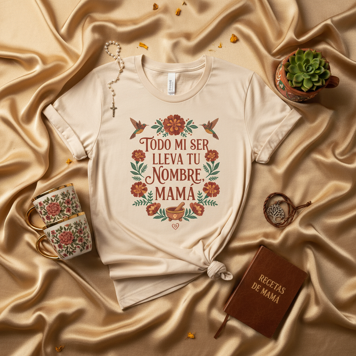 Todo Mi Ser Lleva Tu Nombre, Mamá T-Shirt | Spanish Mother's Day Tee | Floral Design with Hummingbirds | Recetas de Mamá Inspired Gift | Latina Mom Shirt | Regalo para Mamá | Beige Short Sleeve Unisex Shirt