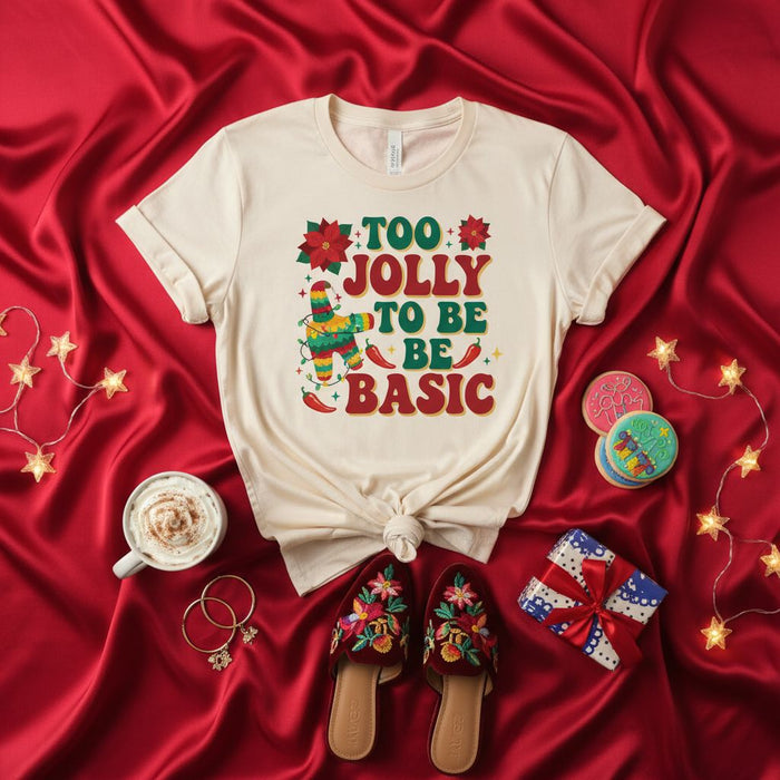 Too Jolly To Be Basic Christmas T-Shirt, Funny Holiday Fiesta Shirt with Pinata and Poinsettia Graphic, Unisex Short Sleeve Tee for Merry and Bright Celebrations