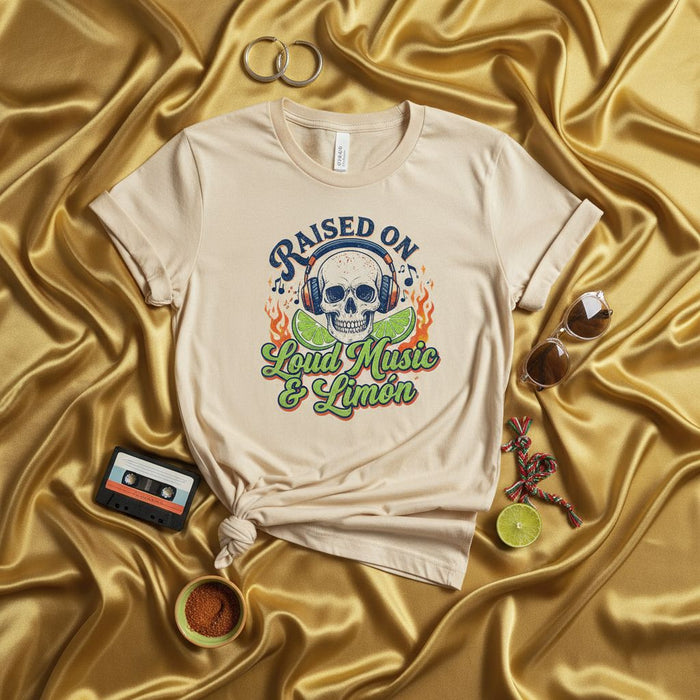 Raised on Loud Music & Limón Unisex T-Shirt | Skull with Headphones, Lime Slices, Fire Flames, Music Lover Tee, Spanish English Phrase, Latino Culture Inspired Apparel