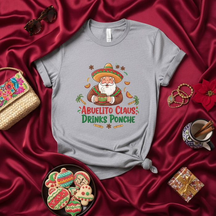 Abuelito Claus Drinks Ponche: Funny Mexican Santa with Sombrero Christmas T-Shirt, Holiday Spanish Phrase Tee, Festive Winter Drink Graphic Shirt.