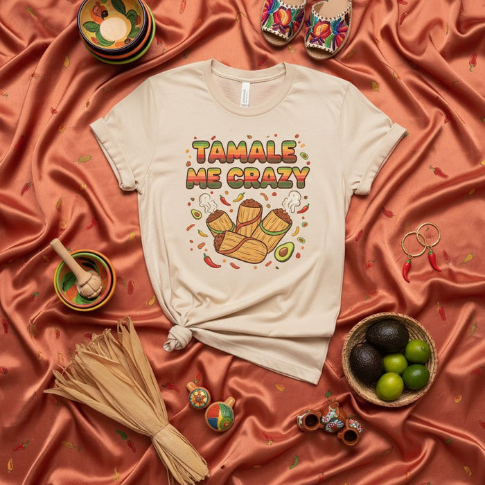 Tamale Me Crazy Graphic T-Shirt | Funny Mexican Food Pun Tee | Unisex Corn Husk Tamales Avocado Peppers Shirt for Fiesta Holiday Cinco de Mayo Gift