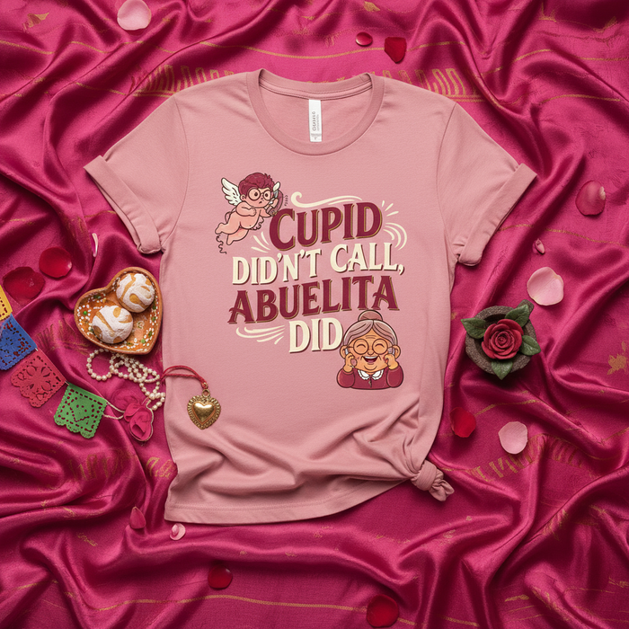 Cupid Didn't Call, Abuelita Did Funny Valentine's Day T-Shirt, Abuela Shirt, Spanish Grandma Gift, Cute Anti-Valentine Tee, Pink Unisex Top with Cupid and Abuelita Graphic