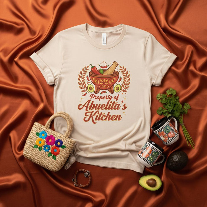 Property of Abuelita's Kitchen T-Shirt with Molcajete, Avocado, and Chili Peppers Graphic, Unisex Hispanic Heritage Cooking Shirt, Funny Spanish Grandma Gift Tee