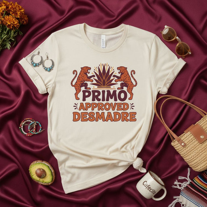 Primo Approved Desmadre Shirt, Unisex Desert Cat Agave T-Shirt, Funny Spanish Cousin Approved Party Tee, Retro Inspired Family Gathering Gift Idea, Beige Graphic Top