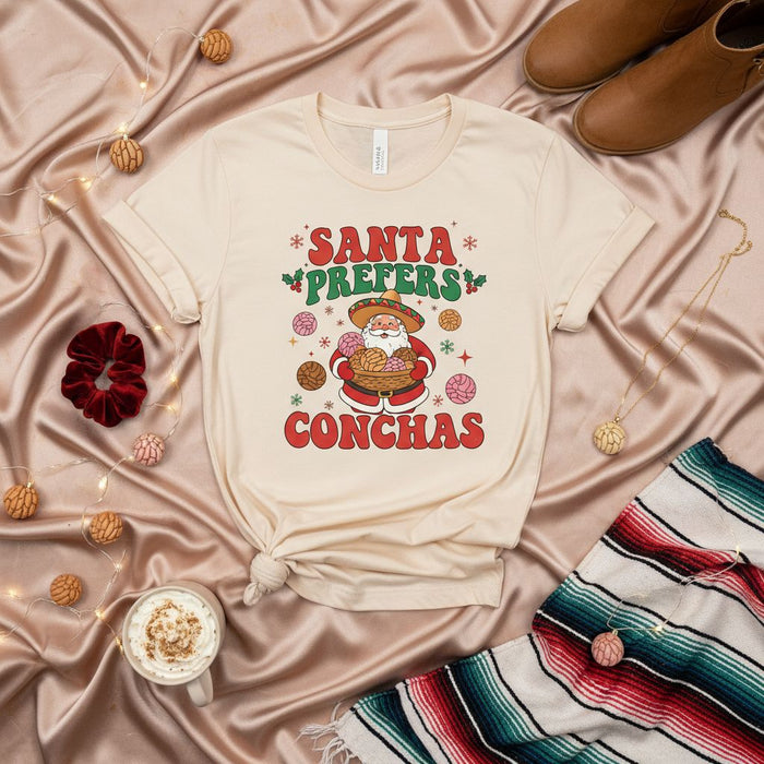 Santa Prefers Conchas T-Shirt, Funny Mexican Christmas Tee, Pan Dulce Lover Gift, Cute Santa Sombrero Holiday Shirt, Navidad Fiesta Unisex Top