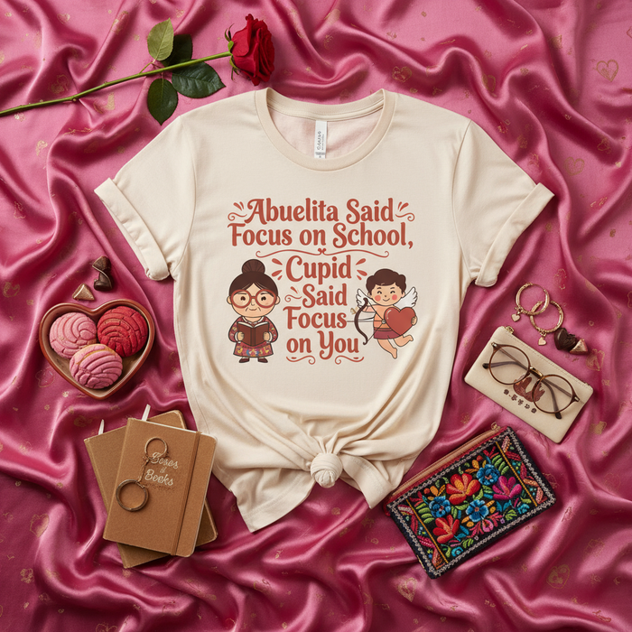 Abuelita Said Focus on School, Cupid Said Focus on You T-Shirt, Funny Valentine's Day Shirt, Cute Abuela and Cupid Graphic Tee, Hispanic Culture Gift, Unisex Love Shirt