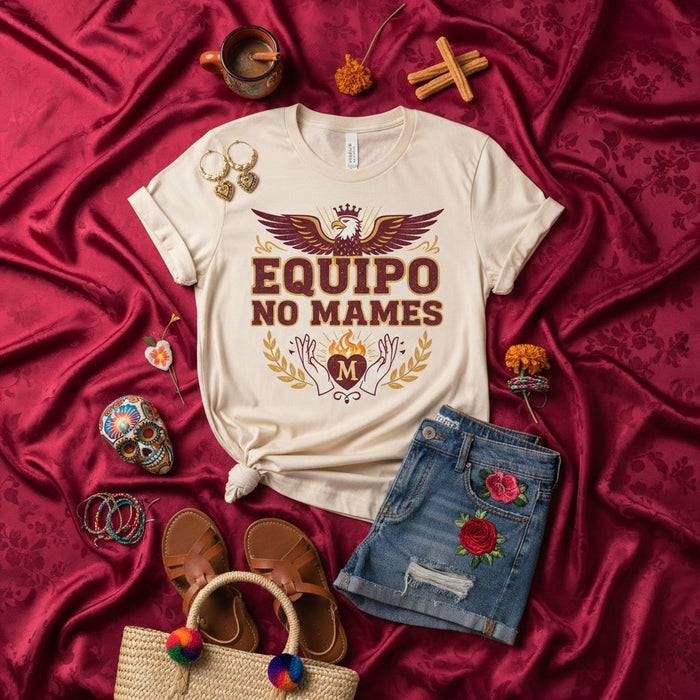 Equipo No Mames T-Shirt with Eagle, Heart, and Wreath Graphic - Funny Spanish Slang Tee for Unisex Adult & Youth - Novelty T-Shirt Gift Idea with Distressed Denim Shorts Outfit Flat Lay for Product Photography