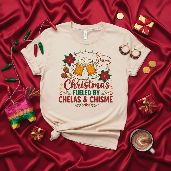 Christmas Fueled By Chelas & Chisme T-Shirt Unisex, Funny Holiday Shirt with Beers, Poinsettias, Maracas, & Chisme Speech Bubble, Festive Latinx Xmas Tee Gift