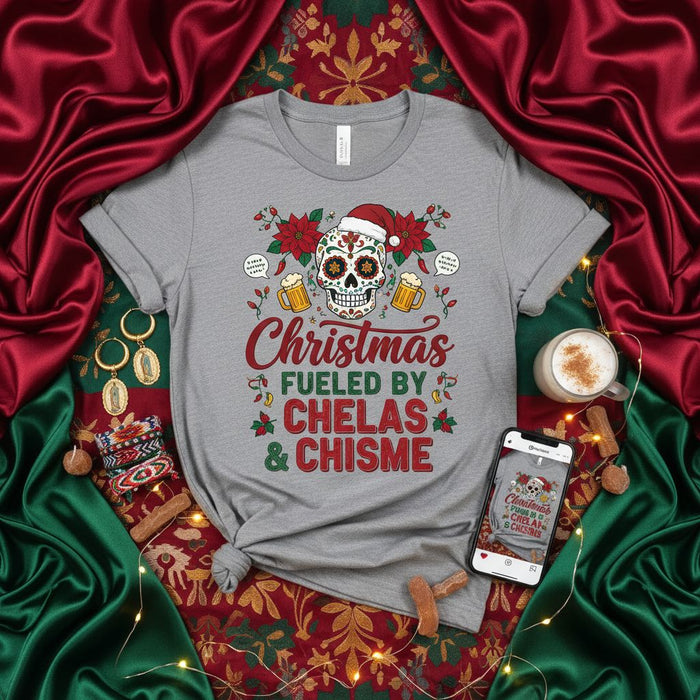 Christmas Fueled By Chelas & Chisme Sugar Skull T-Shirt, Funny Mexican Holiday Tee, Poinsettia Design, Unisex Dia De Muertos Christmas Party Shirt, Spanish English Phrase, Beer Lovers Gift Idea