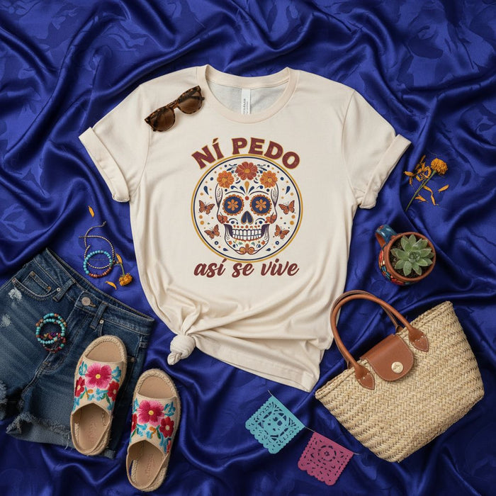 Ní PEDO Así Se Vive Sugar Skull T-Shirt, Día de Muertos Floral Calavera Tee, Mexican Culture Shirt, Boho Summer Unisex T-shirt with Espadrilles and Shorts, Festival Apparel.