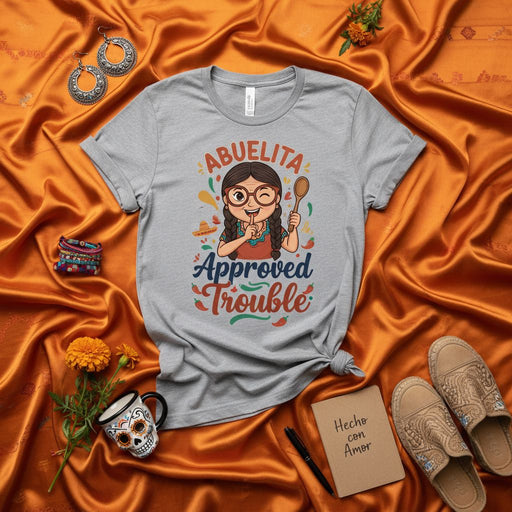 Abuelita Approved Trouble T-Shirt: Funny Spanish Grandma Approved Design for Abuela, Nana, or Tia Gift, Hispanic Heritage Tee with Cute Winking Girl and Spoon Mexicada
