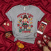 Abuelita Claus Already Knows The Chisme Christmas T-Shirt, Funny Hispanic Grandma Holiday Tee, Mexican Family Gift, Cute Latinx Holiday Apparel with Tamales and Poinsettias Mexicada