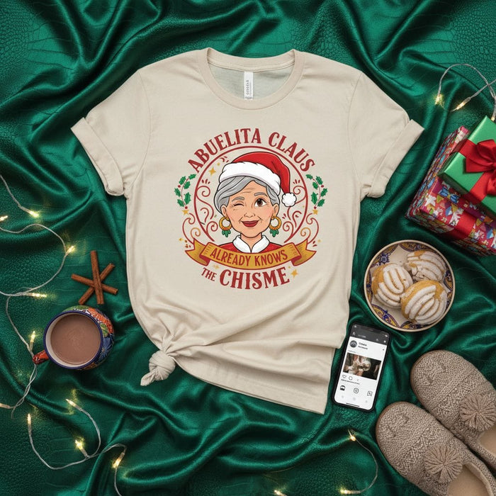 Abuelita Claus Already Knows The Chisme Christmas T-Shirt, Funny Hispanic Grandma Holiday Tee, Winking Santa Abuela Shirt, Latinx Family Gift Idea Mexicada