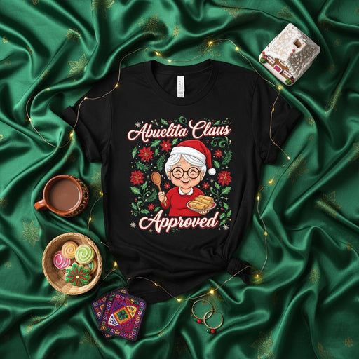 Abuelita Claus Approved T-Shirt Funny Christmas Grandma Spanish Holiday Gift Tee with Tamales and Santa Hat, Festive Floral Graphic Unisex Shirt Mexicada