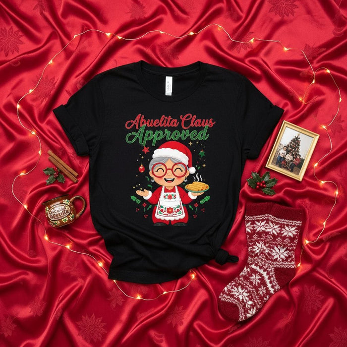 Abuelita Claus Approved T-Shirt Funny Christmas Shirt for Grandma, Abuela, or Hispanic Grandmother, Holiday Gift Tee with Santa Hat and Tamales Design Mexicada