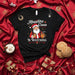 Abuelita Claus Is Watching T-Shirt | Funny Hispanic Christmas Santa Grandma Tee | Cute Holiday Family Gift for Grandmother, Abuela, Nana, Spanish-Speaking Family, Christmas Party Shirt Mexicada