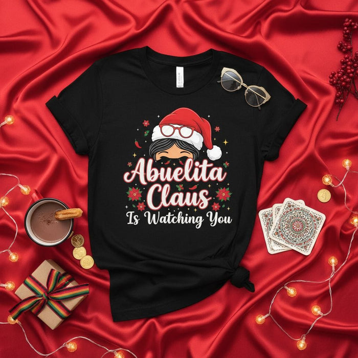 Abuelita Claus Is Watching You Christmas T-Shirt, Funny Grandma Holiday Shirt, Abuela Santa Tee, Spanish English X-Mas Present, Unisex Adult Gift Idea, Festive Family Party Top Mexicada