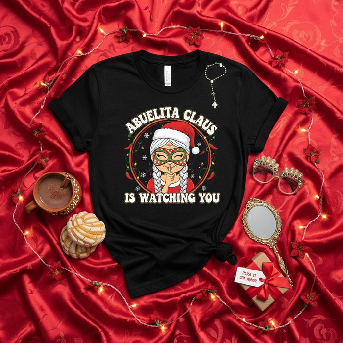 Abuelita Claus Is Watching You Funny Christmas T-Shirt, Mexican Grandma Holiday Tee with Chiles, Cute Abuela Santa Outfit Gift for Hispanic Grandmother Mexicada
