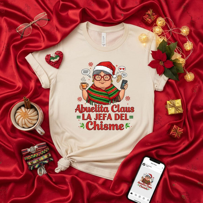 Abuelita Claus La Jefa Del Chisme T-Shirt Christmas Family Holiday Gift Tee for Grandmother Nana Abuela Grandma Funny Spanish Quote Short Sleeve Unisex Shirt Mexicada