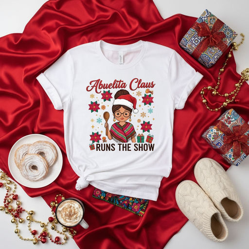 Abuelita Claus Runs The Show Christmas T-Shirt, Funny Grandma Holiday Shirt, Latina Abuela Gift, Mexican Floral Poinsettia Tee for Grandmothers, Festive Family Gathering Outfit Idea Mexicada