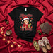 Abuelita is Boss Christmas T-Shirt with Santa Hat, Winking Abuela Holding Corn, Sugar Skulls, Poinsettias, and Festive Holiday Design for Hispanic Grandmother Gift Idea Mexicada