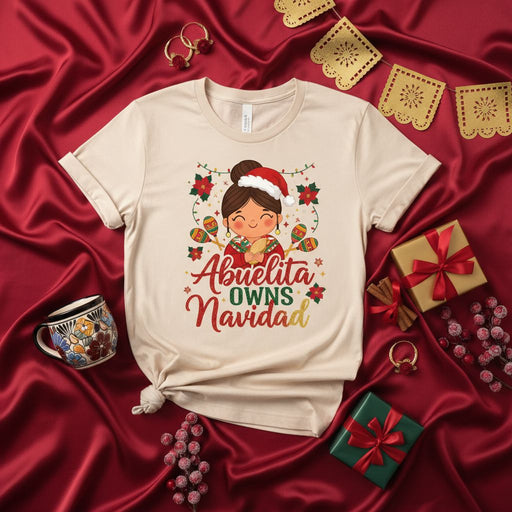 Abuelita Owns Navidad Christmas Shirt, Funny Spanish Grandma Tee, Latina Holiday Gift for Abuela, Mexican Mamas Claus T-Shirt with Maracas & Papel Picado Mexicada