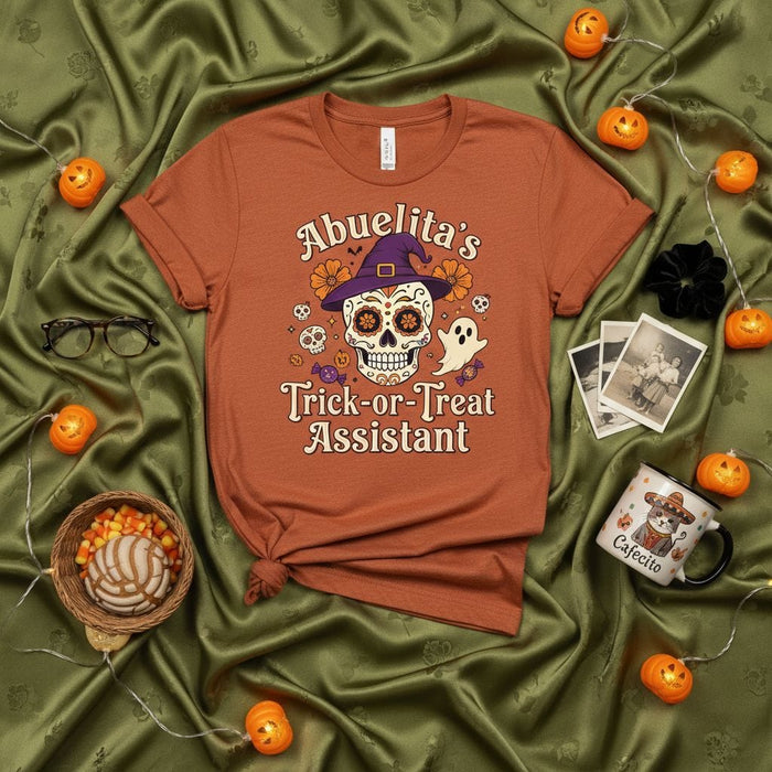 Abuelita's Trick-or-Treat Assistant T-Shirt, Sugar Skull Halloween Tee, Dia de los Muertos Costume Helper Shirt, Fun Hispanic Grandma Trick or Treating Gift Idea for Fall Holiday Celebration Mexicada
