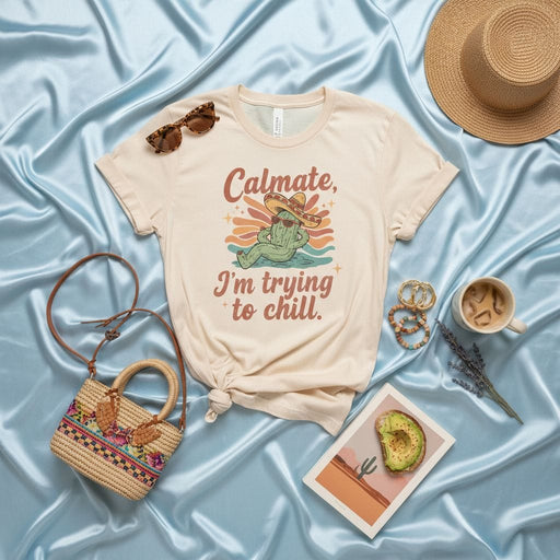 Calmate, I'm trying to chill. Funny Relaxed Cactus in Sombrero T-Shirt, Desert Sunset Vintage Style Graphic Tee, Unisex Spanish English Pun Vacation Shirt for Men and Women Mexicada