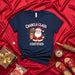Chancla Claus Certified T-Shirt for Christmas: Funny Santa Holding a Slipper, Holiday Latine Family Gift, Unisex Navy Tee with Spanish and English Text Mexicada