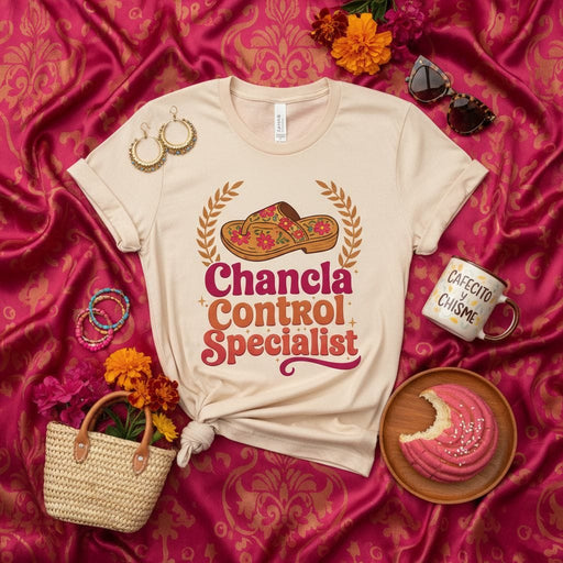 Chancla Control Specialist T-Shirt, Funny Latina Mom Shirt, Hispanic Heritage Gift, Spanglish Saying Tee, La Chancla Flip Flop Graphic, Día de Muertos Inspired Floral Sandals Shirt, Cafecito y Chisme Mug Accessory Photo, Beige Unisex Apparel Mexicada