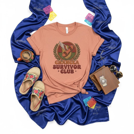 Chancla Survivor Club T-Shirt, Funny Latino Heritage Shirt, La Chancla Gift, Spanish Joke Tee, Retro Graphic Unisex Shirt, Latinx Culture Apparel, Wreath Sandal Design, Peach Color Top Mexicada