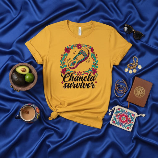 Chancla Survivor T-Shirt | Funny Hispanic Mom Culture Flip Flop Design | Unisex Latino Heritage Gift Tee with Floral Wreath Graphic Mexicada