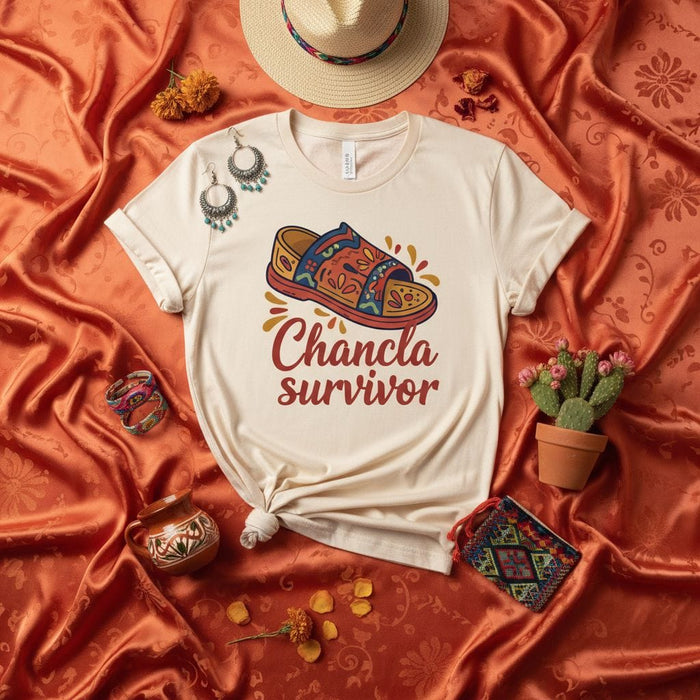 Chancla Survivor T-Shirt | Funny Hispanic Mom Latina Culture Chancla Sandal Humor Tee | Mexican Heritage Gift Unisex Graphic Shirt Mexicada