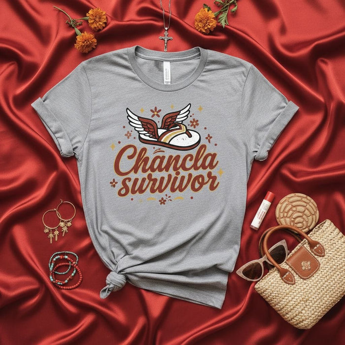 Chancla Survivor T-Shirt Funny Latina Mom Spanking Shirt Spanglish Graphic Tee Culture Gift La Chancla Sandal with Wings Unisex Top Mexicada