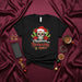 Christmas con Desmadre y Amor Sugar Skull T-Shirt, Mexican Day of the Dead Christmas Tee, Santa Hat Calavera Shirt, Poinsettia Cactus Holiday Gift, Unisex Black T-Shirt, Spanglish Festive Apparel Mexicada