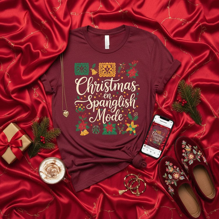 Christmas en Spanglish Mode T-Shirt, Festive Latine Holiday Tee, Merry Spanglish Christmas Shirt, Poinsettia Bells Papel Picado Star Graphic, Unisex Adult and Youth Sizing, Cultural Heritage Gift Idea Mexicada