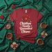 Christmas + Familia = Guaranteed Chisme T-Shirt, Funny Holiday Gift for Latinx Family, Poinsettia and Lights Graphic Tee, Unisex Red Christmas Shirt with Spanish Saying about Gossip Mexicada