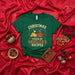 Christmas Fueled By Abuelita's Recipes T-Shirt | Latina Holiday Tamales and Champurrado Tee | Funny Family Gathering X-Mas Gift for Grandmother Granddaughter Grandson | Green Unisex Shirt with Chili Peppers Mexicada