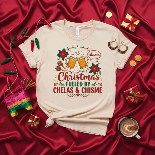 Christmas Fueled By Chelas & Chisme T-Shirt Unisex, Funny Holiday Shirt with Beers, Poinsettias, Maracas, & Chisme Speech Bubble, Festive Latinx Xmas Tee Gift Mexicada
