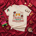 Christmas Fueled By Chelas & Chisme T-Shirt Unisex, Funny Holiday Shirt with Beers, Poinsettias, Maracas, & Chisme Speech Bubble, Festive Latinx Xmas Tee Gift Mexicada