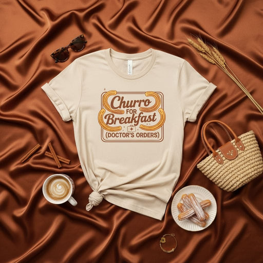 Churro For Breakfast (Doctor's Orders) T-Shirt, Funny Churro Lover Tee, Spanish Dessert Gift, Sweet Pastry Foodie Shirt, Bakery Treat Graphic T-Shirt, Unisex Softstyle Casual Wear Mexicada