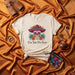 Con Todo, Por Favor Day of the Dead Sugar Skull Sombrero T-Shirt, Día de Muertos Floral Graphic Tee, Mexican Culture Celebration Unisex Shirt, Festive Holiday Apparel Mexicada