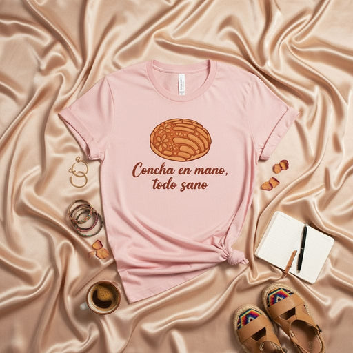 Concha en mano, todo sano Mexican Sweet Bread T-Shirt Unisex, Hispanic Pan Dulce Pastry Comfort Tee, Spanish Language Foodie Shirt, Gift for Latina/Latino, Soft Pink Color Mexicada