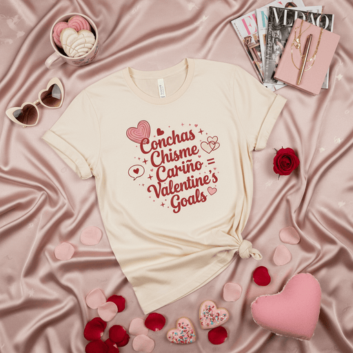 Conchas Chisme Cariño Valentine's Goals T-Shirt, Cute Latinx Valentine's Day Gift for Her, Unisex Graphic Tee with Hearts and Spanish Words. Mexicada